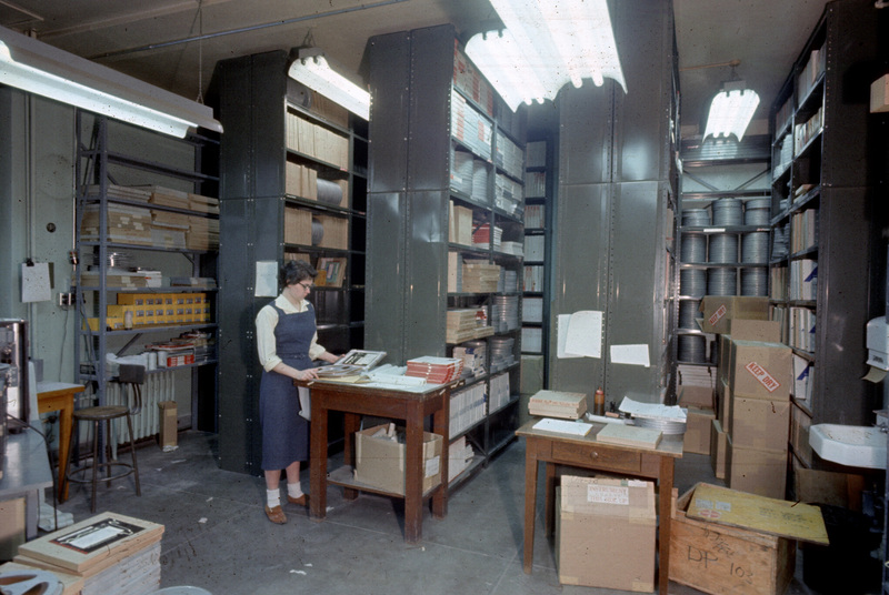 Annabelle Hudmon with Explorer I data tapes in the basement of MacLean Hall at the State University of Iowa