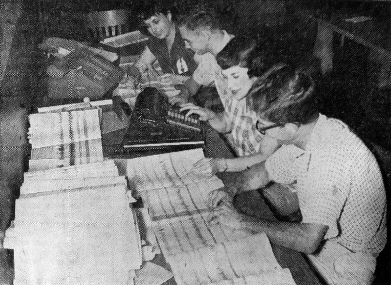 Four University of Iowa students working to transcribe the Explorer 1 audio tape data as it comes into the lab.