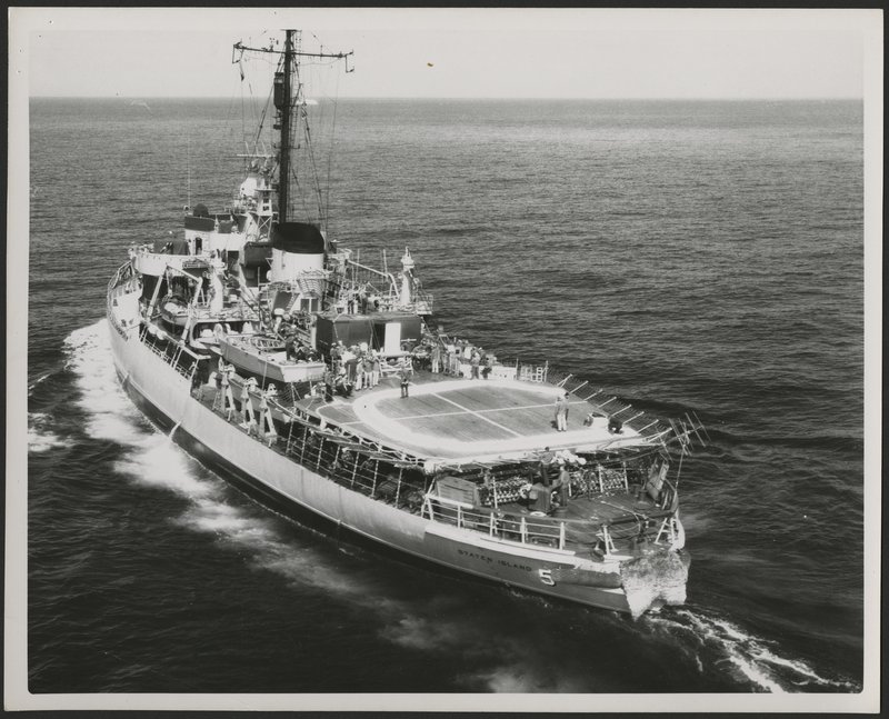 Image taken from Les Meredith Expedition scrapbook, depicts the expedition ship on water