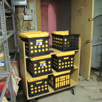 In-process Library cart with cleaned data tapes in new yellow envelop enclosures